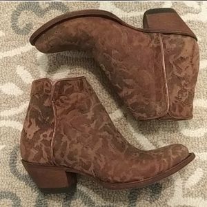 Johnny Ringo cheetah print booties.